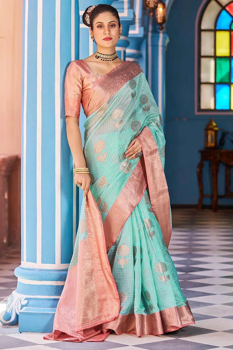 Luxuriant Sea Green Organza Silk Saree With Fantabulous Blouse Piece