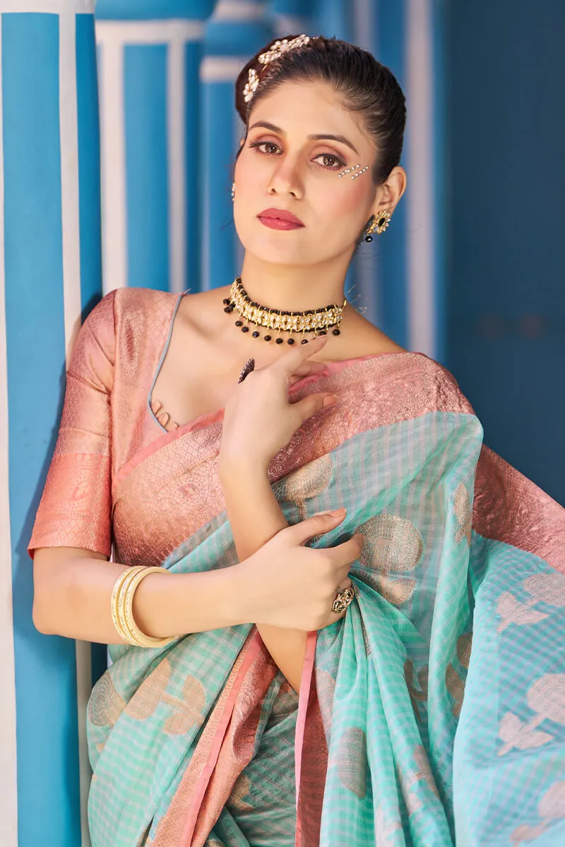 Luxuriant Sea Green Organza Silk Saree With Fantabulous Blouse Piece