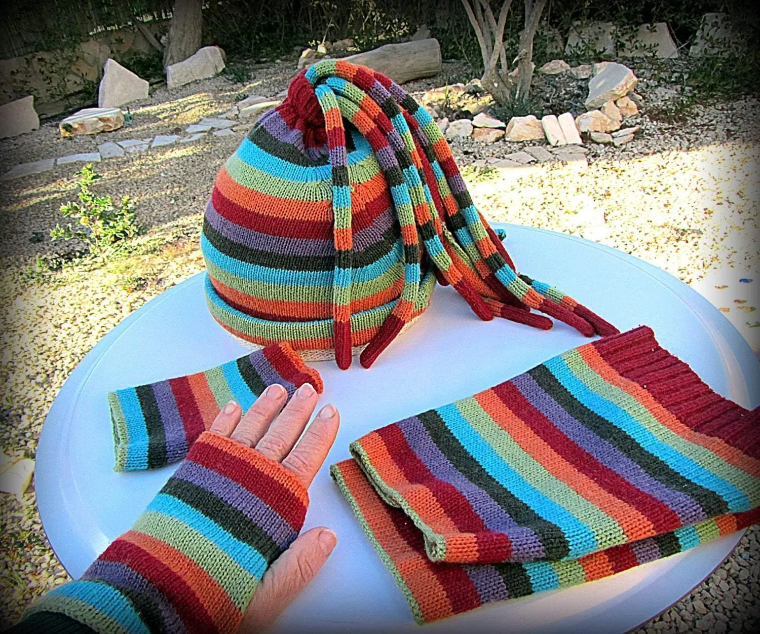 Striped Knitted set: a beanie cap, fingerless gloves and gaiters